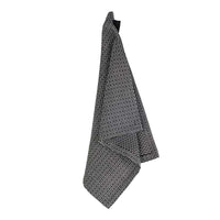 evening grey wash cloth hanging up