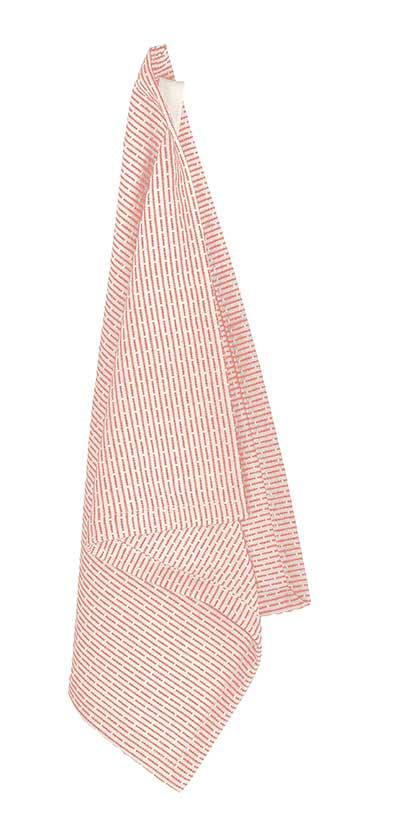 stone coral organic wash cloth hanging up