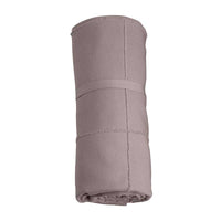 rolled up calm towel to go