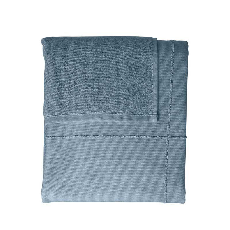 grey blue towel to wrap folded up