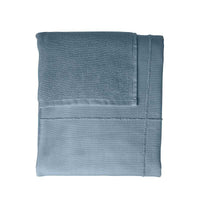 grey blue towel to wrap folded up