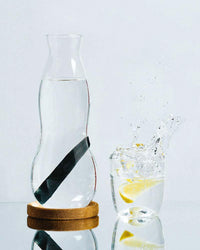 glass carafe next to glass