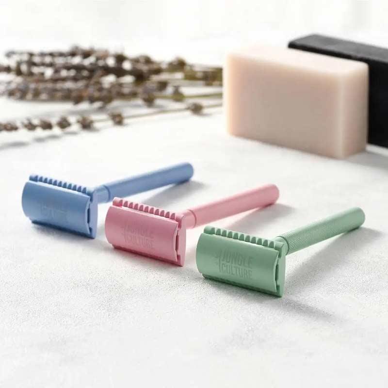 pastel coloured safety razors laying down