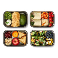 lunchbox with bamboo lid with food prepped inside