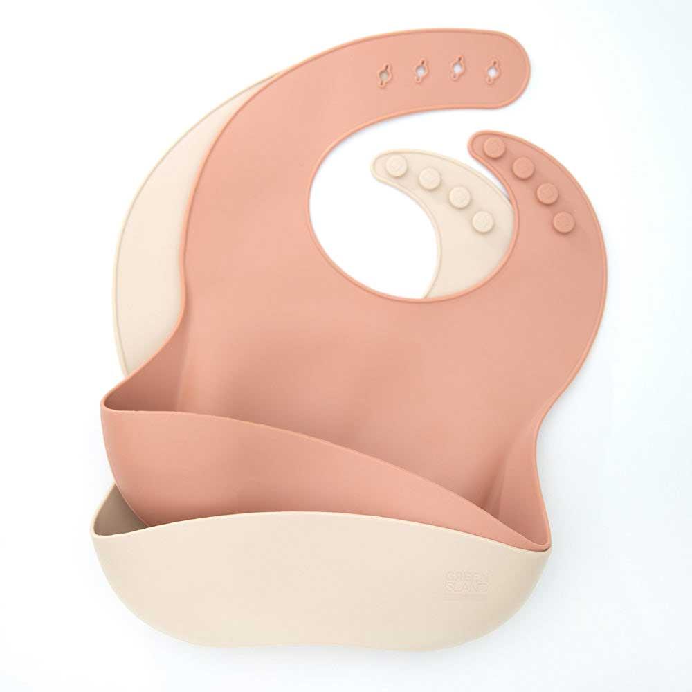 silicone baby bib in blush and cream