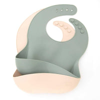 silicone baby bib in cream and green