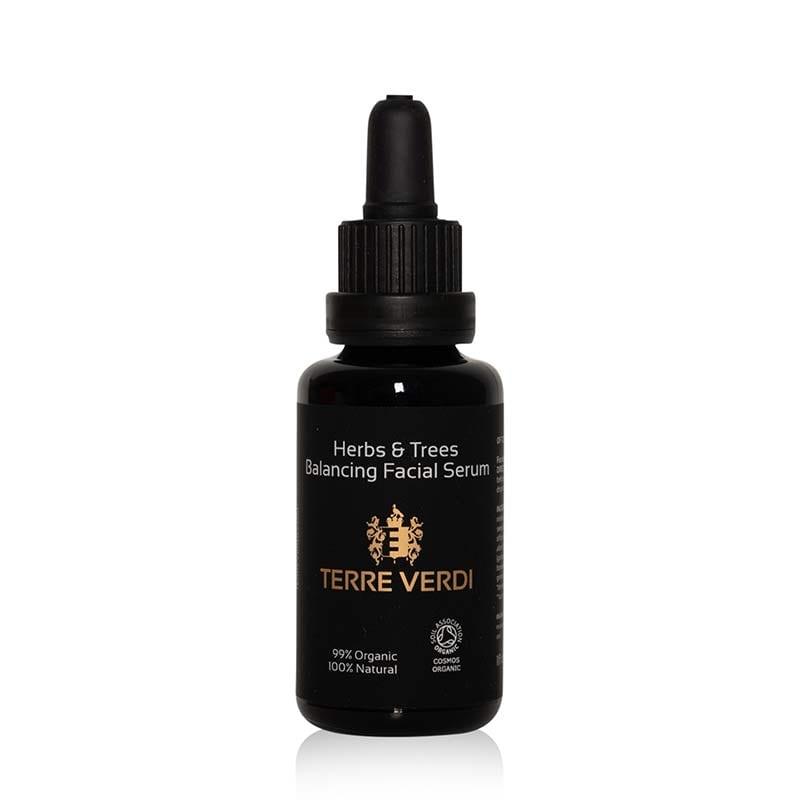 balancing facial serum on white background
