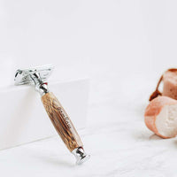 bamboo safety razor in a bathroom