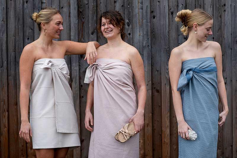 3 women with calm towels from the organic company