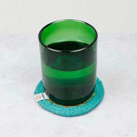 glass on a natural coaster