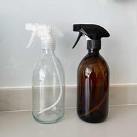 glass trigger spray bottles on kitchen side