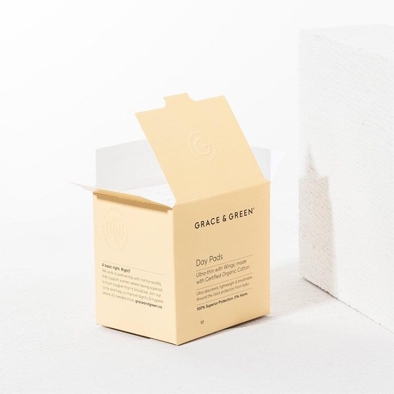 organic cotton period pads in orange box