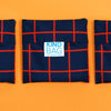 reusable shopping bag on orange background