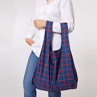 woman carrying reusable shopping bag