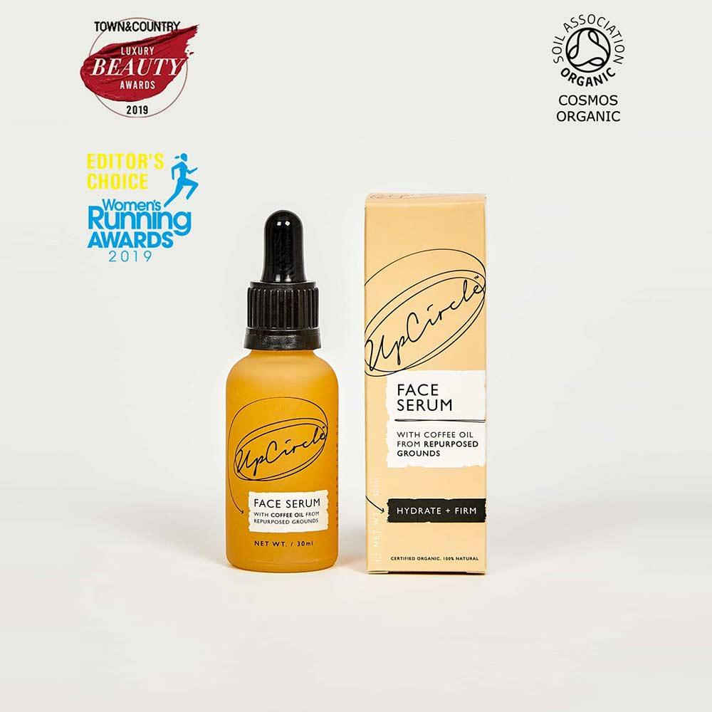 organic face serum next to packaging