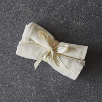 organic muslin cloths on stone worktop