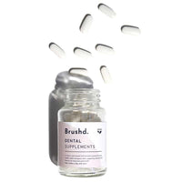 dental supplements in jar with lid off