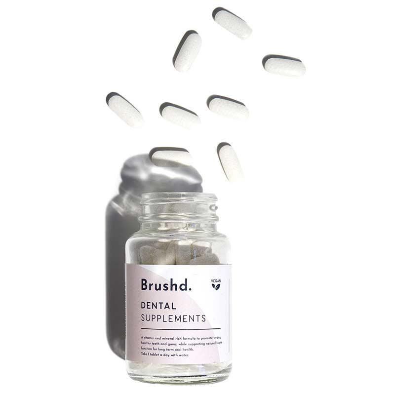 dental supplements in jar with lid off