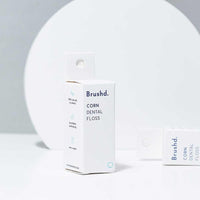 brushd corn dental floss in box