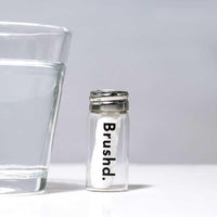drushd corn dental floss in glass jar