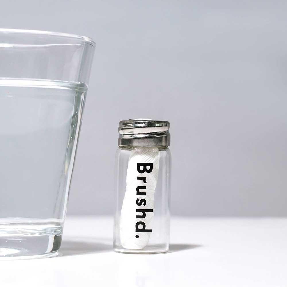 drushd corn dental floss in glass jar