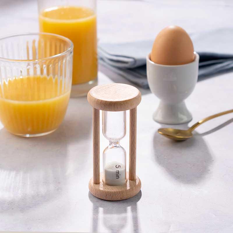 wooden egg timer on kitchen worktop