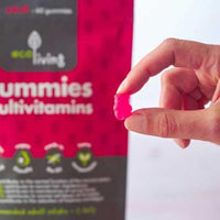someone holding a vegan gummy multivitamins