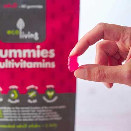 someone holding a vegan gummy multivitamins