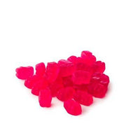 pile of vegan gummy multivitamins on white background