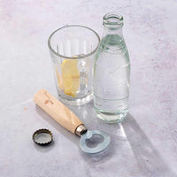 wooden bottle opener on a table