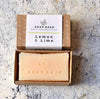 handmade bar of soap in cardboard packaging