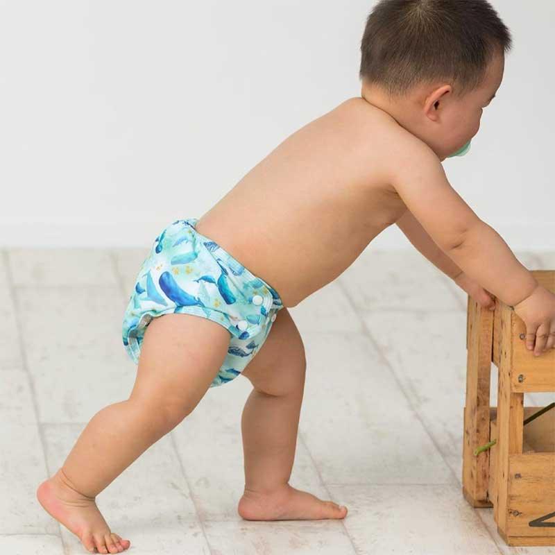 baby wearing a little lamb reusable nappy
