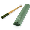 moss green truthbrush next to packaging