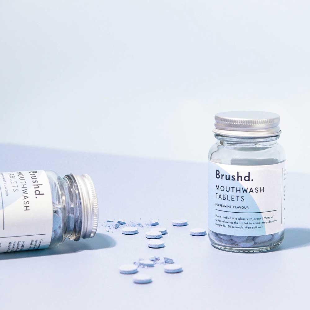 peppermint ,outhwash tablets on blue background