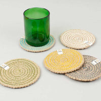 jute coasters on a table