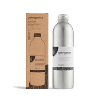 charcoal mouthwash next to packaging