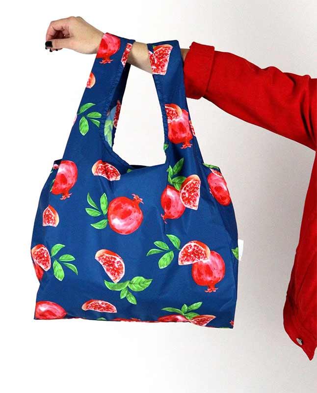 shopping bag hanging from womans arm