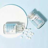 two bottles of brushd toothpaste tablets