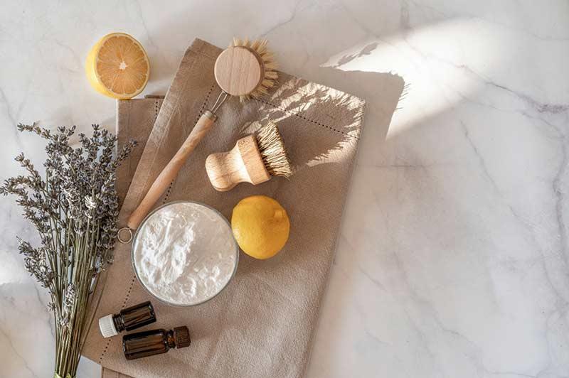 diy natural cleaning products on a table spread