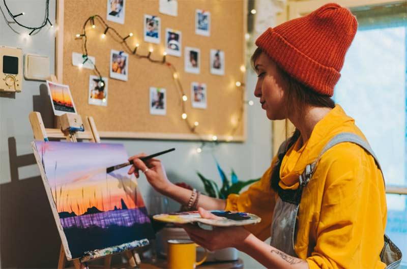 Women painting with eco friendly paints