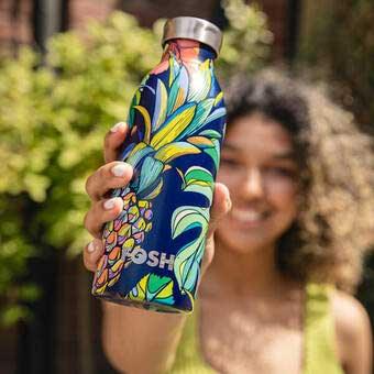 woman on the go with reusable water bottle