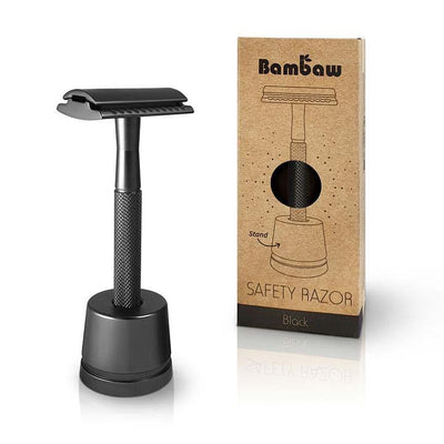 metal safety razor on a stand