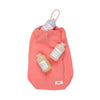 all purpose bag coral with items on it