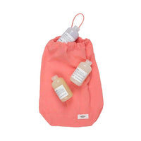 all purpose bag coral with items on it