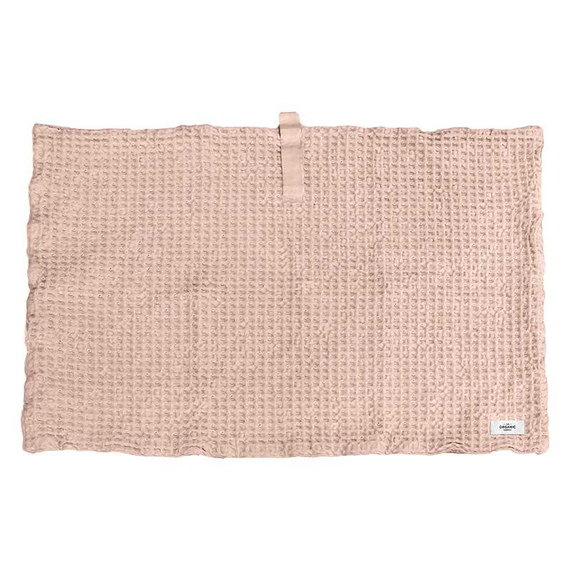 pink bath mat in waffle print