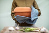 woman using organic cotton oven gloves