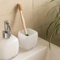 bamboo toothbrush in bathroom