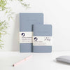 dusty blue pocket journal and notebook