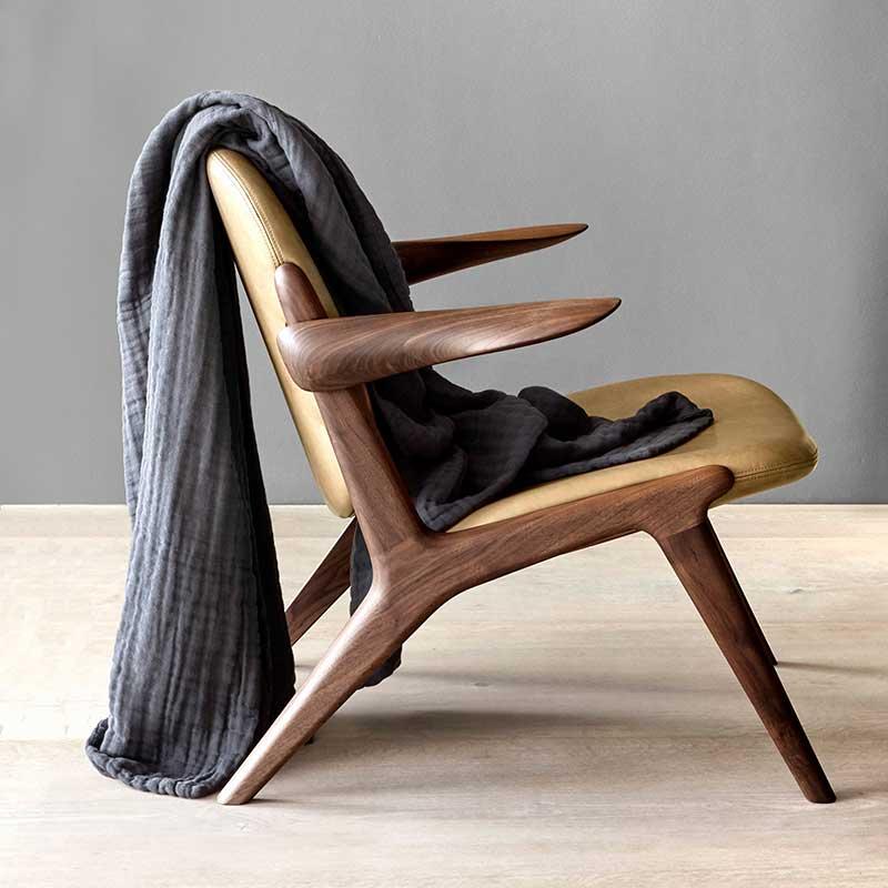 organic cotton blanket over a chair