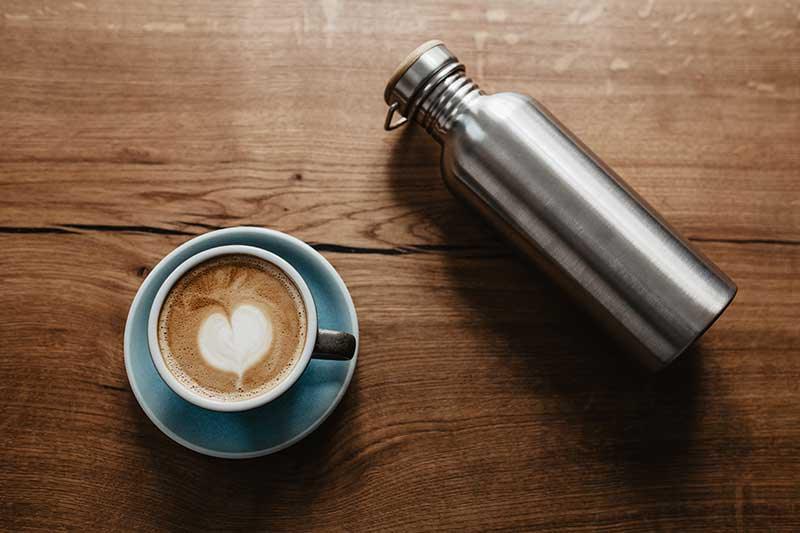 bambaw stainless steel water bottle on wooden table